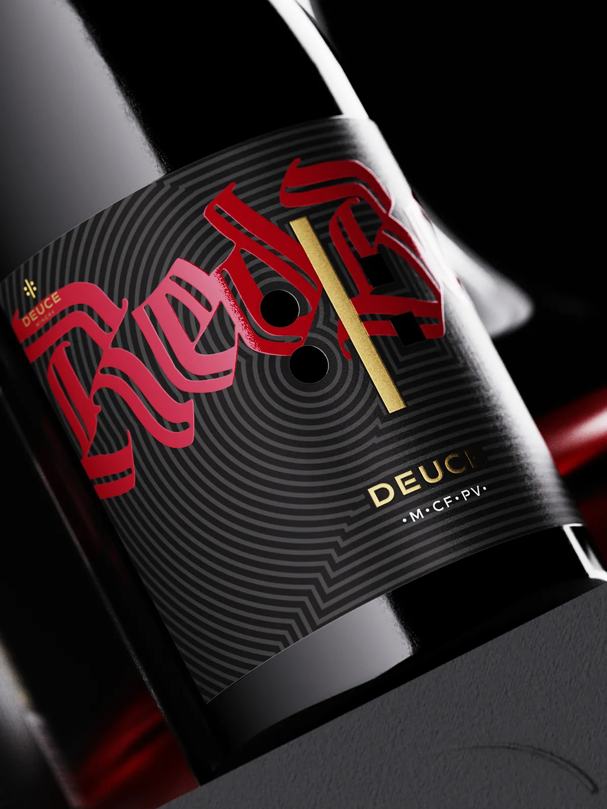 Bold red typography with relief varnish creates a striking, tactile label
