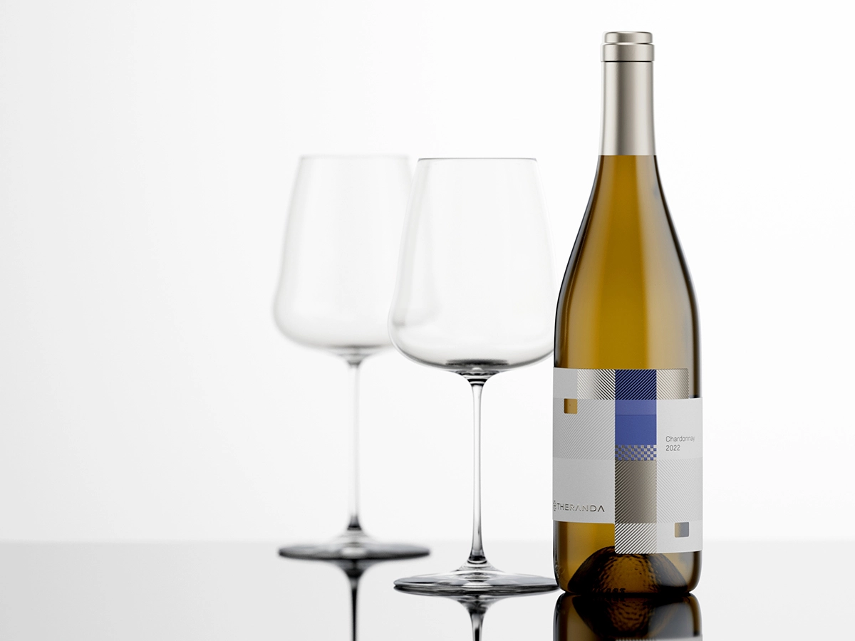Theranda wine bottle with Bauhaus-inspired label and wine glasses in minimalist setting