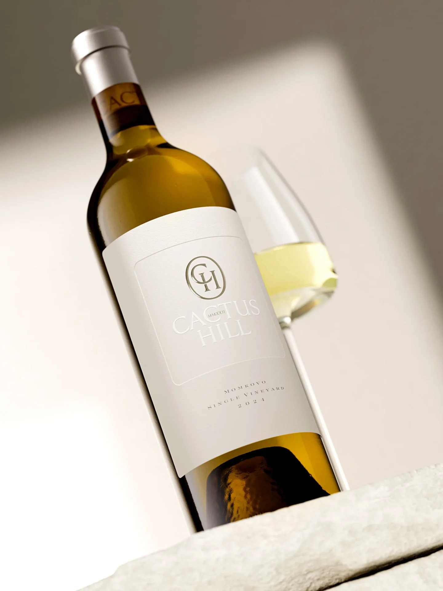 Angled view of Cactus Hill wine bottle showing minimalist luxury wine label with embossed CH monogram — Dagaprint