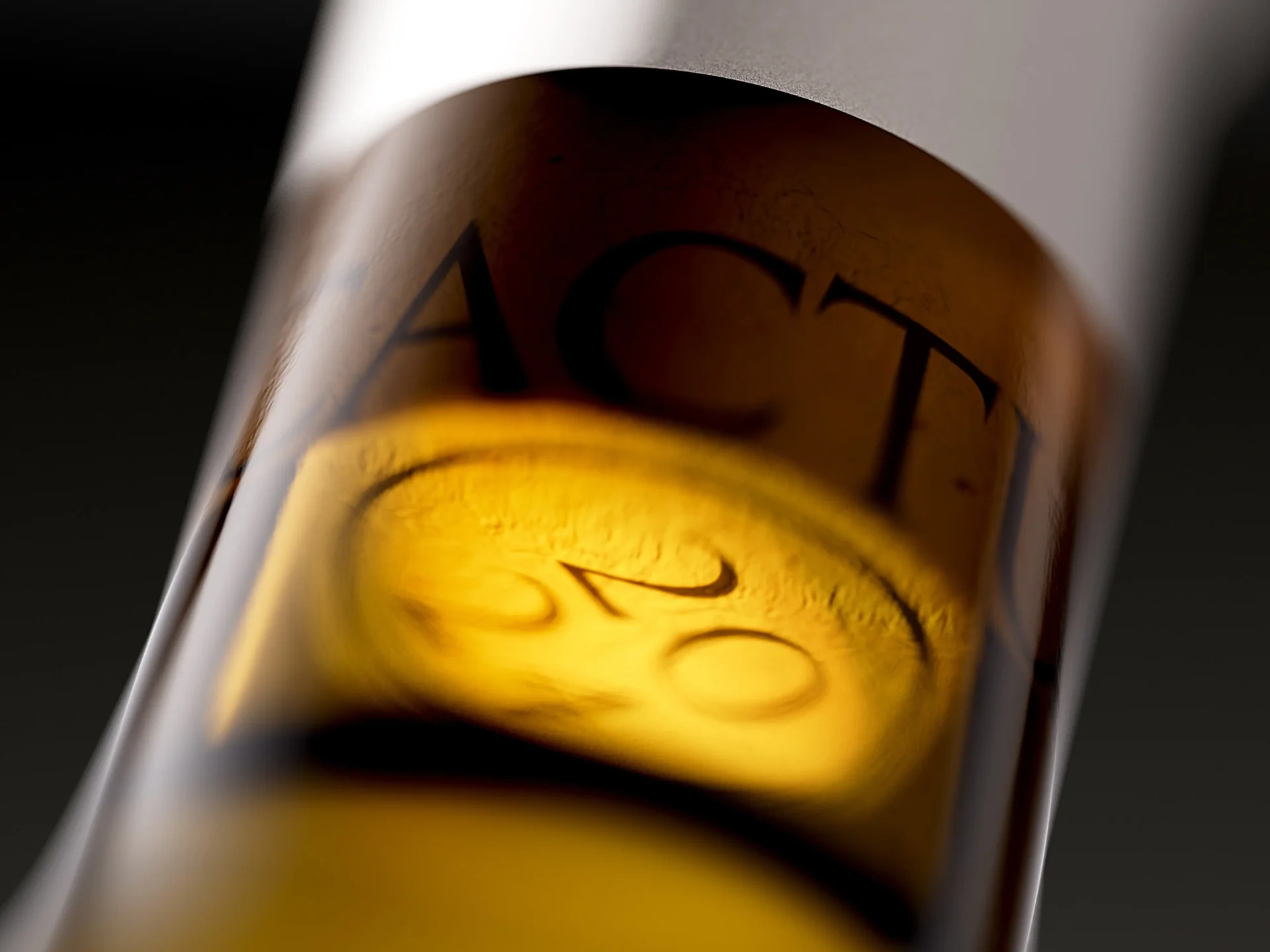 Cactus Hill wine bottle neck showing branded cork and custom cobalt gray capsule — premium wine packaging detail by Dagaprint